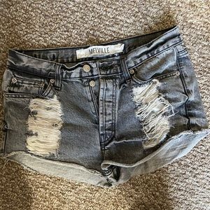 black jean distressed shorts